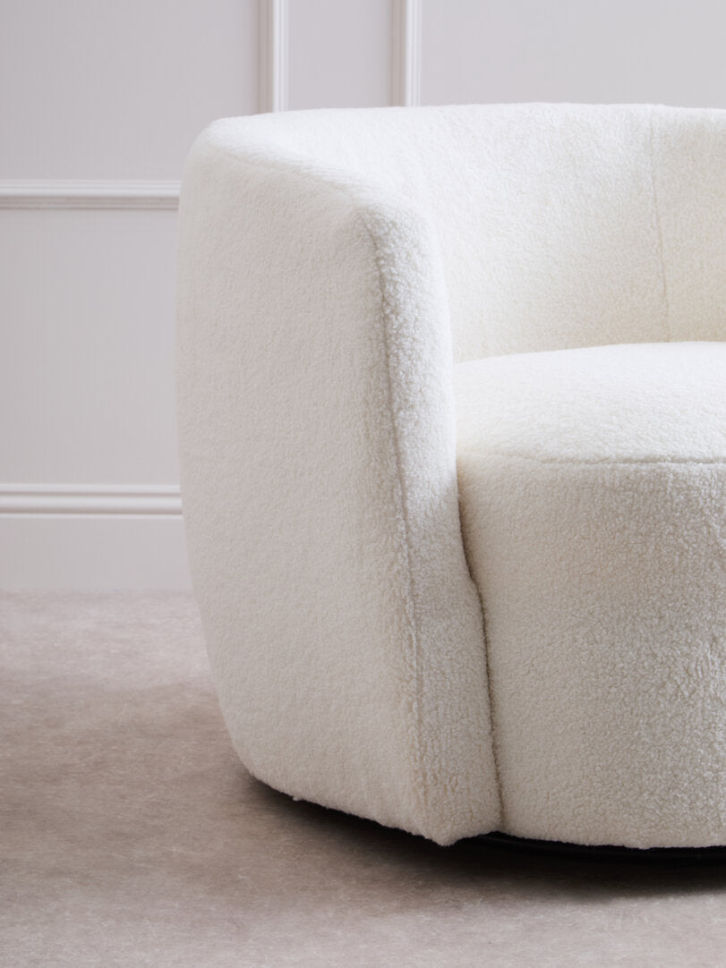 Carlton Ivory Boucle Effect Curved Lounge Chair With Swivel Base