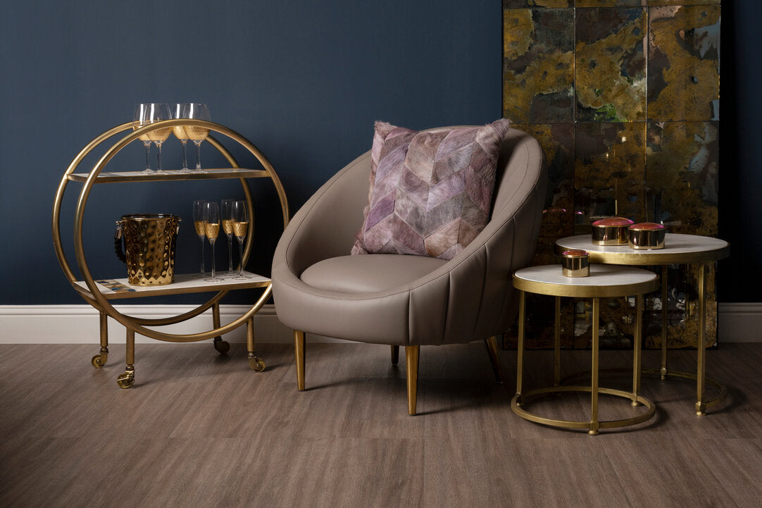 Brown Leather Effect Armchair in a styled room