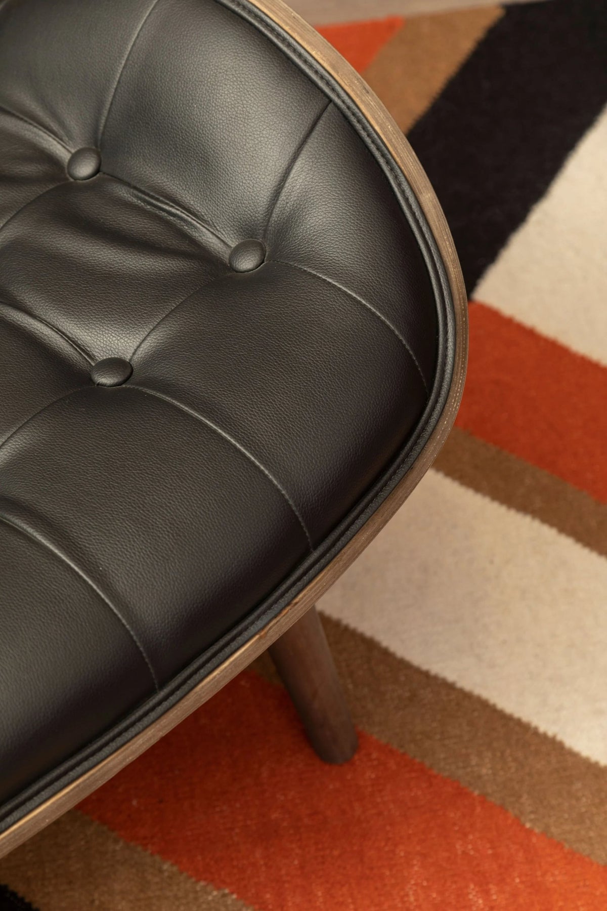 Harrogate Black Leather Effect Chair with Button Detail