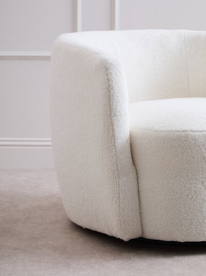 Carlton Ivory Boucle Effect Curved Lounge Chair With Swivel Base